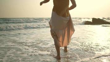 Close Up of Woman Relaxing and Walking in the Waves video