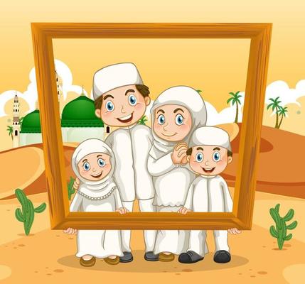 Happy family holding photo frame with mosque on the background