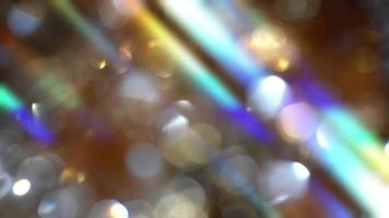 sfondo con bokeh in movimento e riflessi arcobaleno video