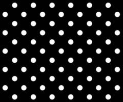 black and white polka dot pattern background vector