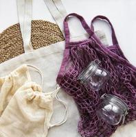Mesh bag cotton bags and glass jars photo