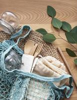 Mesh bag cotton bags and glass jars photo