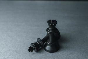 Chess pieces, supremacy of the black pieces photo