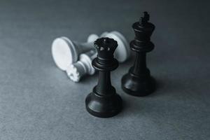 Chess pieces, supremacy of the black pieces photo