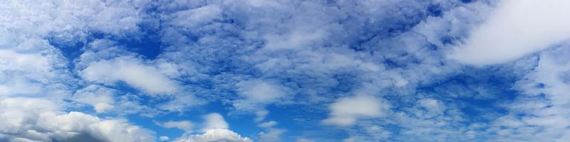 Panorama sky with beautiful cloud on a sunny day photo