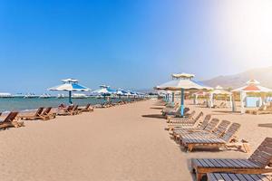 Sunbeds on the beach. photo