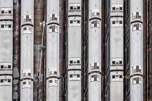 High angle close-up aerial view of Hudson Yards train depot with train lines photo