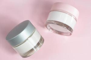 Two view of cosmetic containers photo