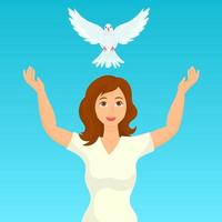 Mujer soltando una paloma blanca, símbolo de la paz y la libertad.