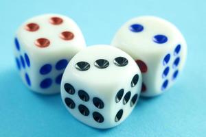 Dice on blue background photo