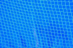 Blue plastic net background photo