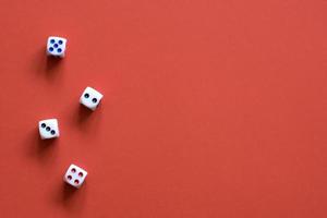 Dice on red background photo