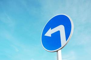 Blue and white road sign photo