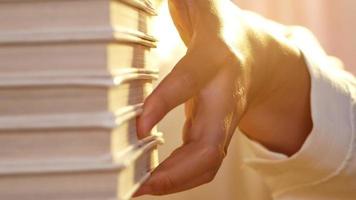 Close up Of a Young Woman Choosing a Book video