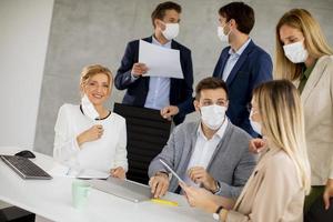 Close-up of a team in masks photo