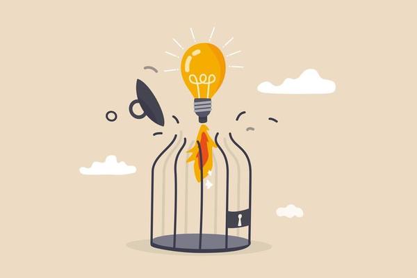 Unleash creativity or unlock business idea to grow beyond limitation concept lightbulb creative idea breaking birdcage with launching  rocket booster