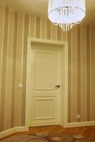 Interior of a room with classic door white doors photo