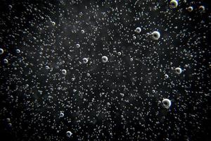 Black abstract background with bubbles