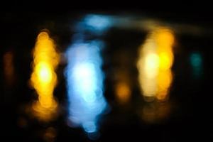 Abstract blurry lights in the dark photo