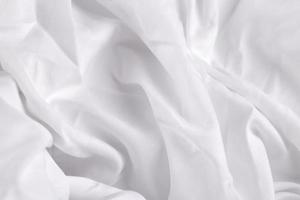 Fondo de textura de tela de lujo de seda blanca o satén suave y elegante textura de sábana de tela foto