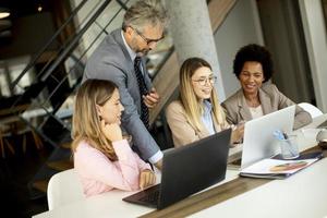 Business people working together in office photo