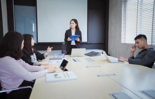 Business meeting at conference table photo