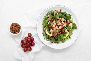 Salad with grapes and nuts for lunch photo