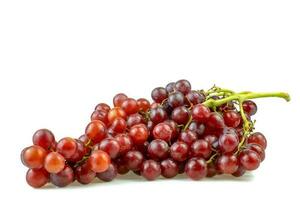Ripe red grape bunch isolated on a white background. photo