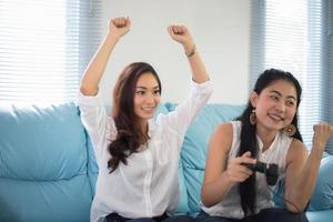 Girls playing video games photo