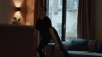 Woman doing exercise in living room video