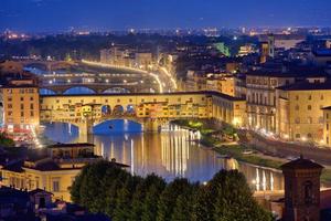 Night view of the River Arno and famous bridge Ponte Vecchio