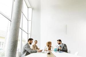 People in a bright office photo