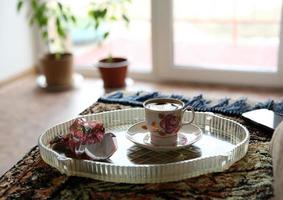 Morning coffee with candy overlooking the terrace photo