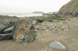 Rocky beach with cliffs photo