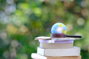 Book on wood table and education learning concept photo