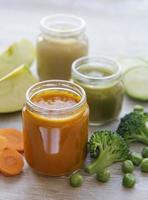 Assortment of fruit and vegetable puree photo