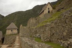 Ruins of Lost Incan City Machu Picchu near Cusco in Peru photo
