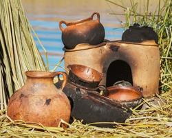 Traditional Mud Pans Used on Uros Islands at Lake Titicaca Peru Bolivia photo