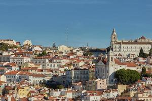 View of traditional architecture and houses on Sao Jorge hill in Lisbon Portugal photo