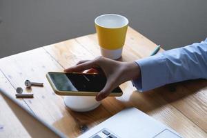 Woman using wireless charging. Technology concept. photo