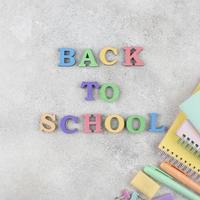 Back to school background with school supplies background photo