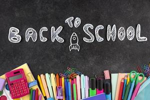 Back to school background with school supplies background photo