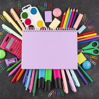 Back to school background with school supplies background photo