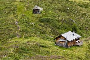 Wooden hut in the Austrian Alps photo