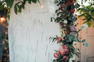 Beautiful flowers in rustic style at a wedding party photo