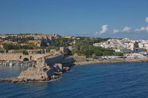 Marine Gate and the fortifications of the Old Town of Rhodes, Greece photo