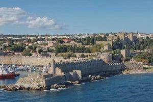 Marine Gate and the fortifications of the Old Town of Rhodes, Greece photo