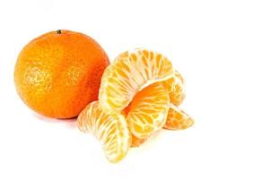 Orange mandarins tangerine peel or mandarin slice isolated on white background photo