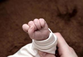 Baby baby hand close up photo