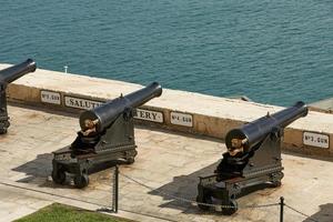 Cannons in row at Upper Barrakka gardens in Valletta in Malta photo